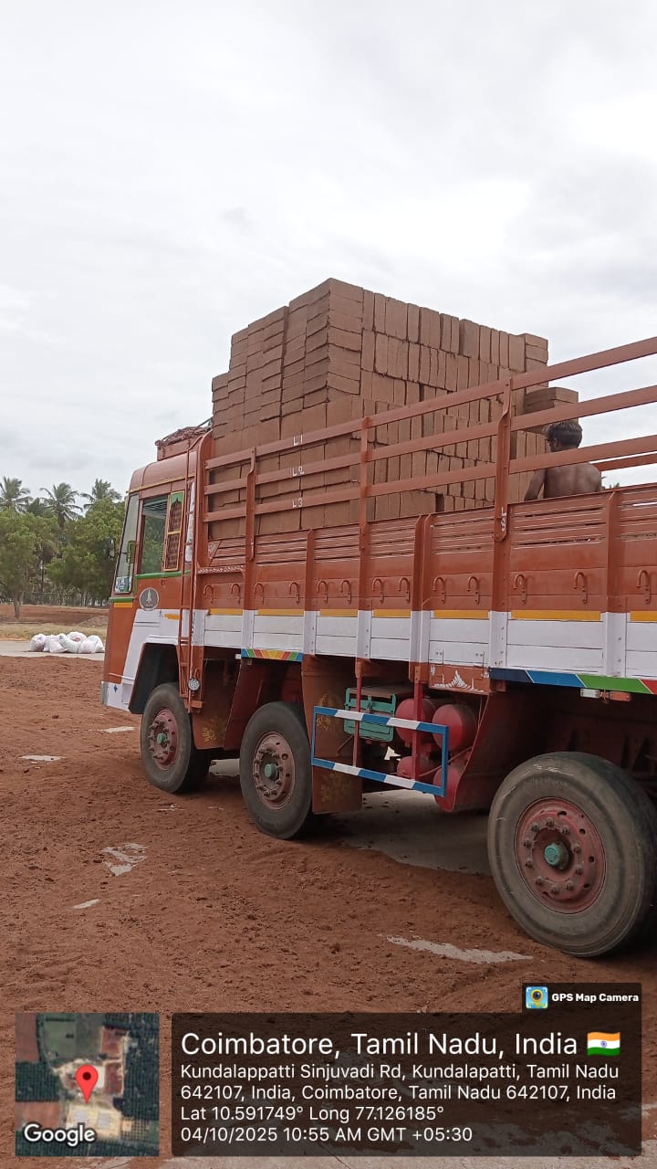 Compressed coco peat blocks being stacked and organized